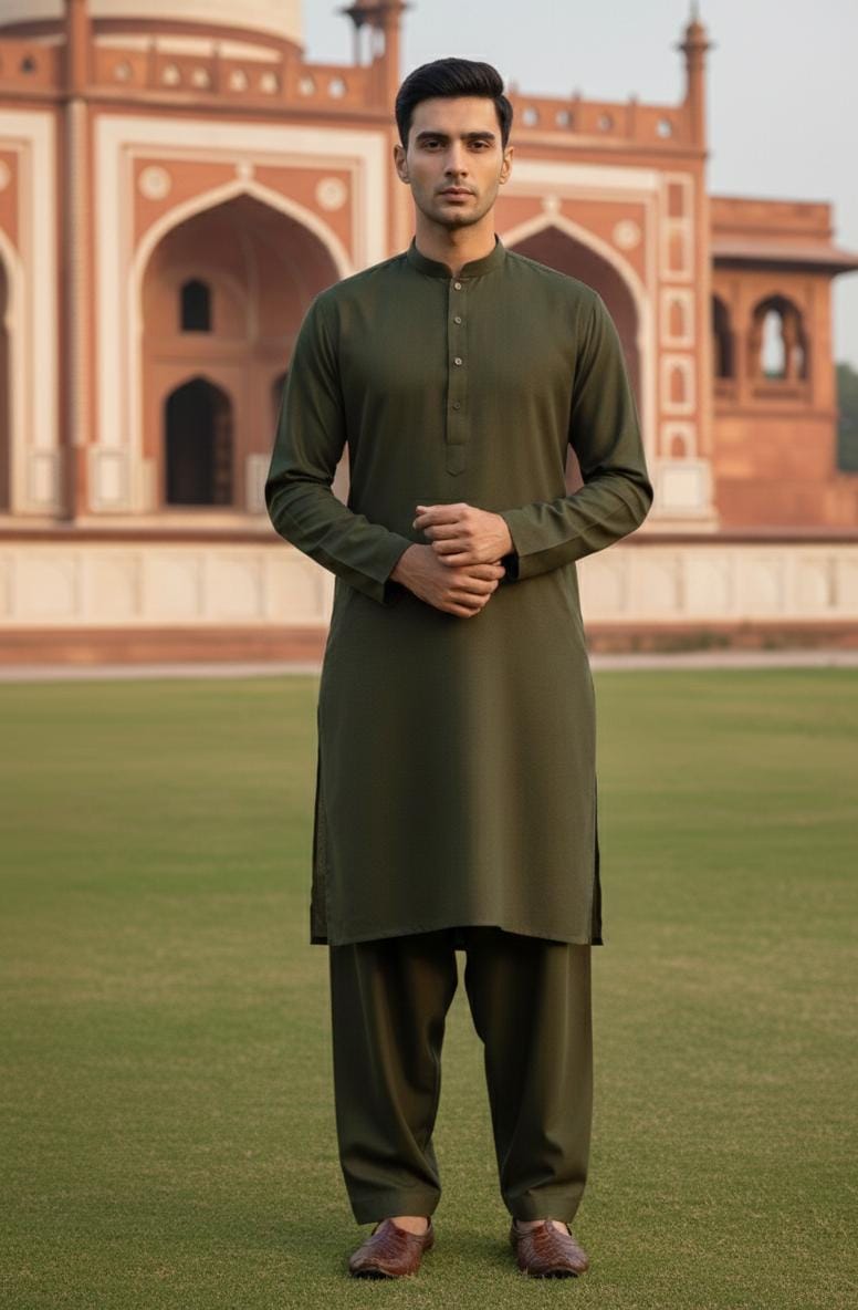 Dark Green Zellbury Mens Wash and Wear unstitched suit worn by a model showcasing a sharp tailored fit for Summer 2026.