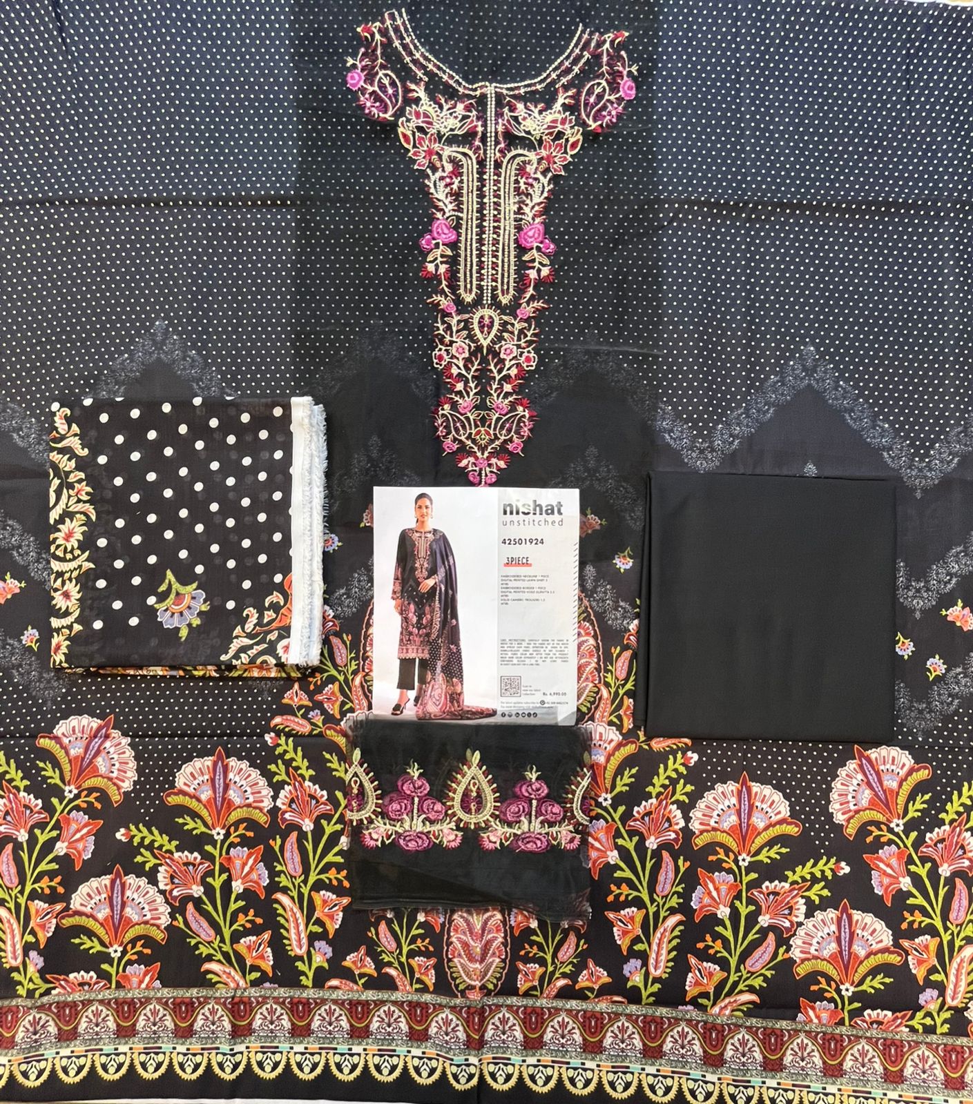 Full layout display of the shirt, dupatta, and trousers of the Nisha By Nishat Embroidered Lawn 3pc.