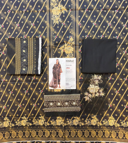 Full layout display of the shirt, dupatta, and trousers of the Nisha By Nishat Embroidered Lawn 3pc.