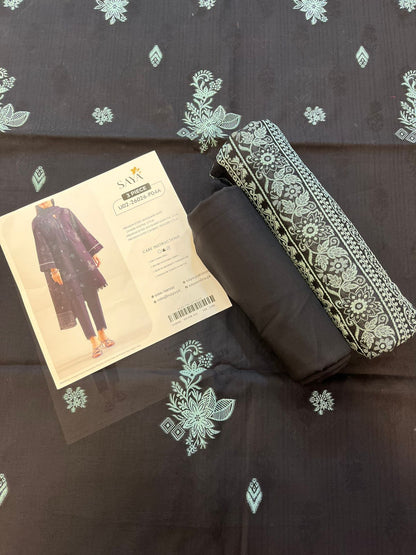 Close-up texture of Black Saya Cotton Jacquard 3pc self-woven fabric.