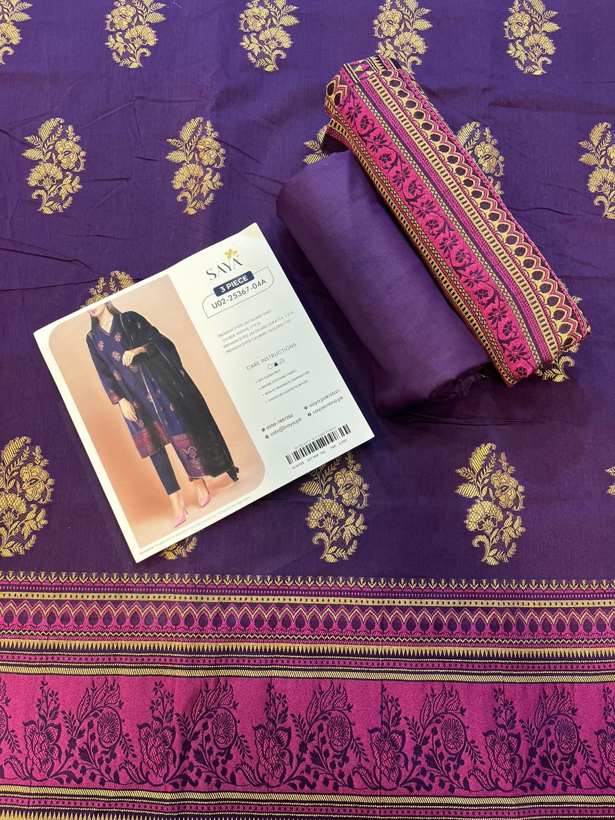 Close-up texture of Dark Purple Saya Cotton Jacquard 3pc self-woven fabric.