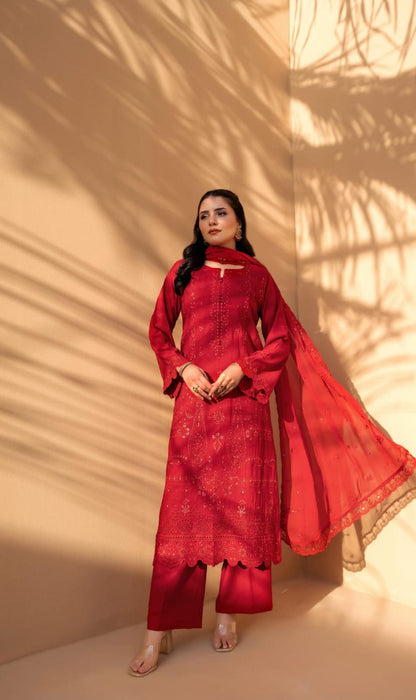 Red Iconic Rujhan Luxury Cotton 3pc suit worn by model showcasing a classic luxury festive ensemble.