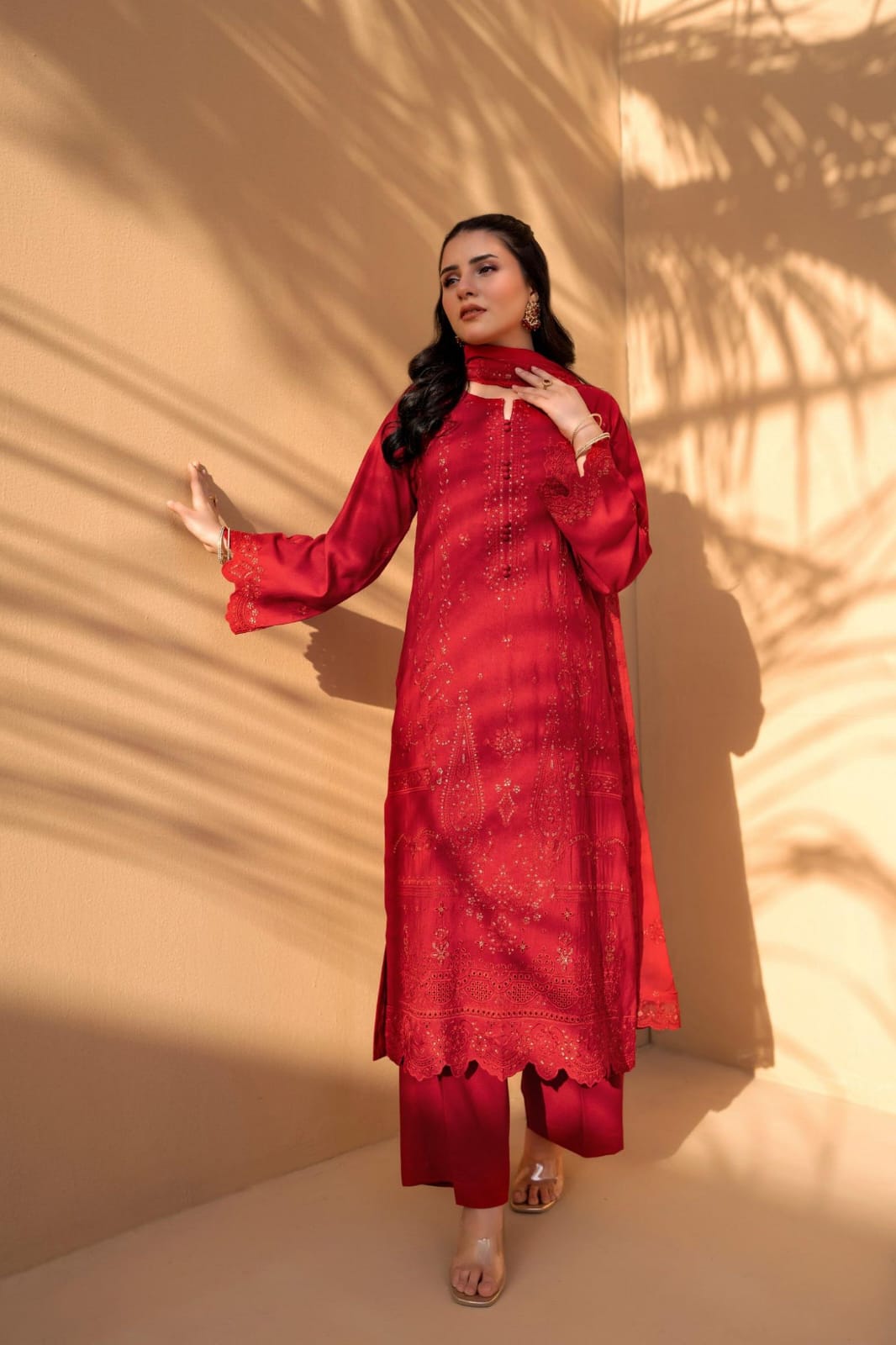 Red Iconic Rujhan Luxury Cotton 3pc suit worn by model showcasing a classic luxury festive ensemble.