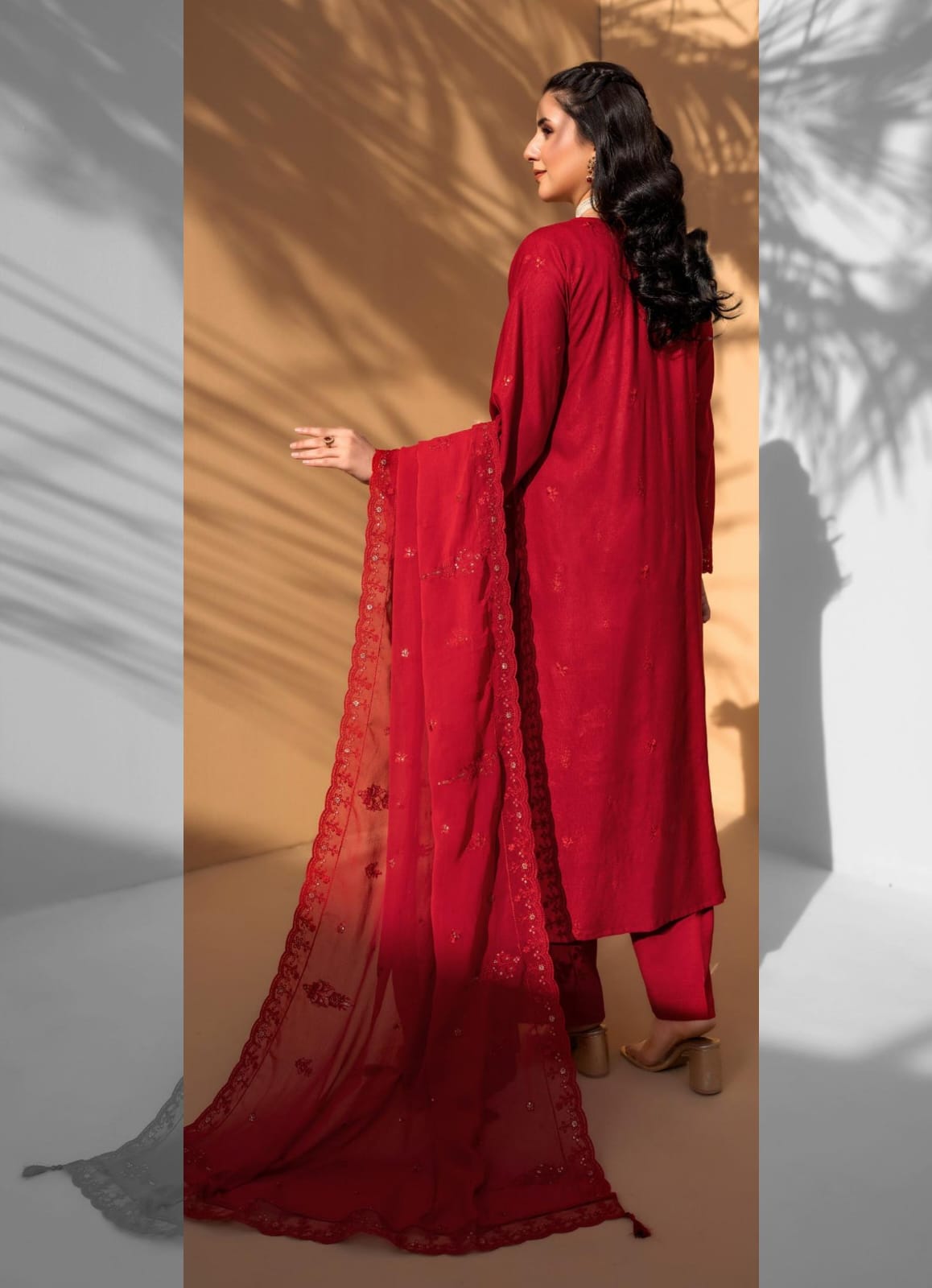 Red Iconic Rujhan Luxury Cotton 3pc suit worn by model showcasing a classic luxury festive ensemble.