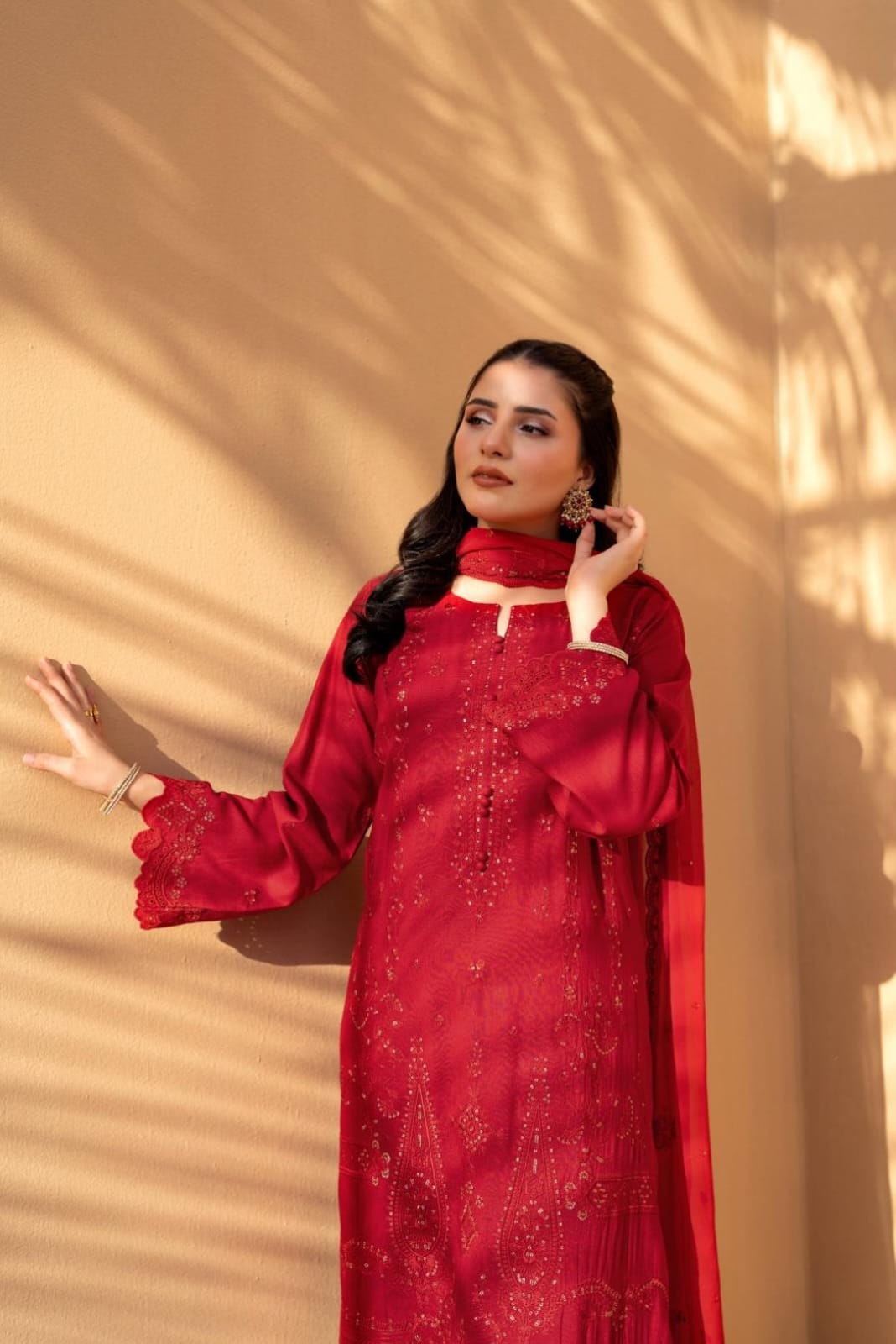 Red Iconic Rujhan Luxury Cotton 3pc suit worn by model showcasing a classic luxury festive ensemble.