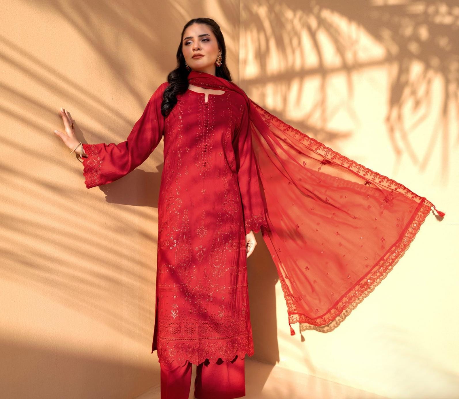Red Iconic Rujhan Luxury Cotton 3pc suit worn by model showcasing a classic luxury festive ensemble.