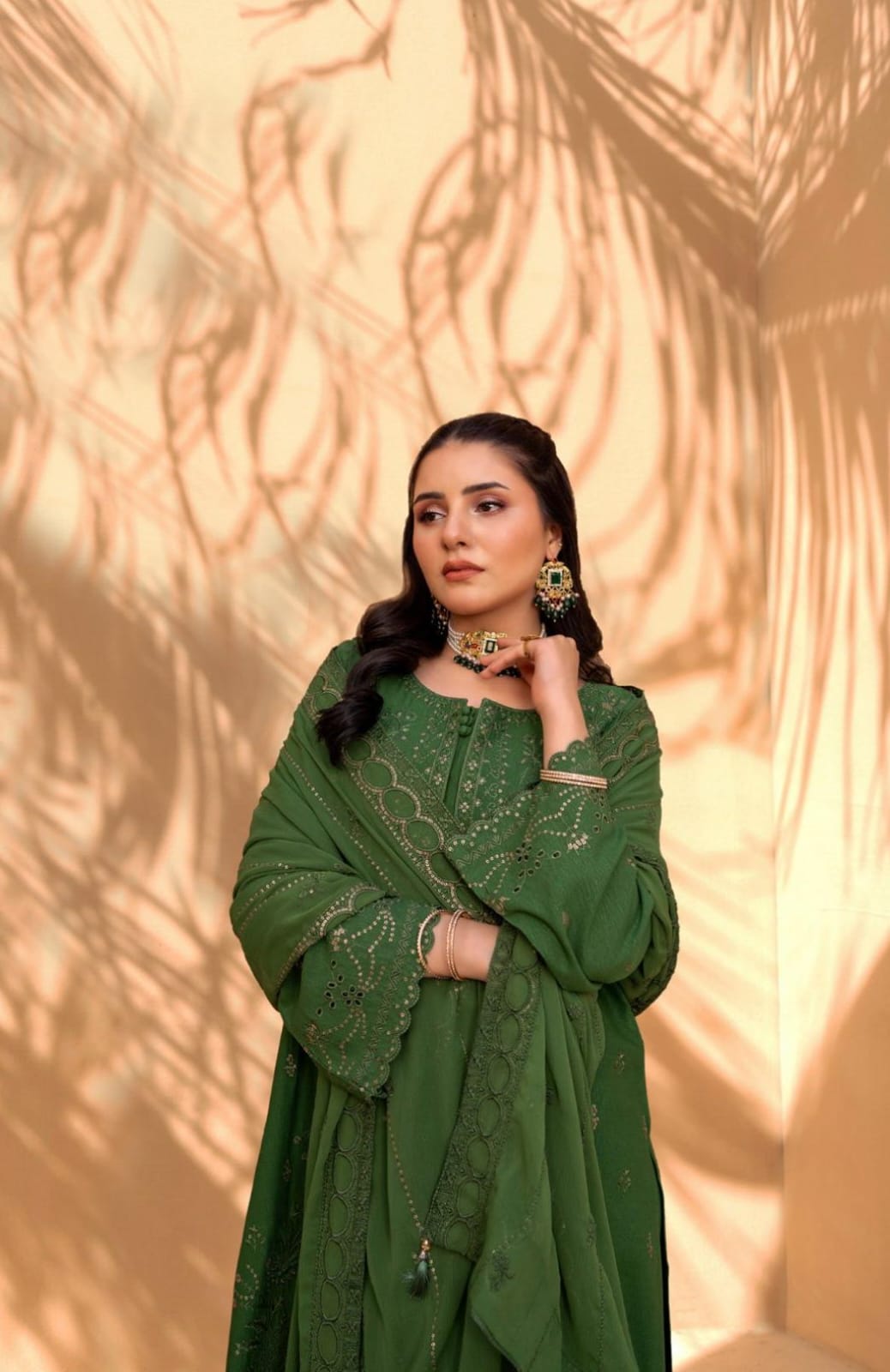 Green Iconic Rujhan Luxury Cotton 3pc suit worn by model highlighting the luxury chiffon dupatta.