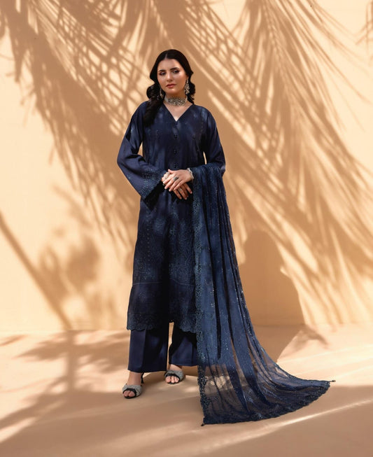 Blue Iconic Rujhan Luxury Cotton 3pc suit worn by model for Eid 2026 festive celebrations.