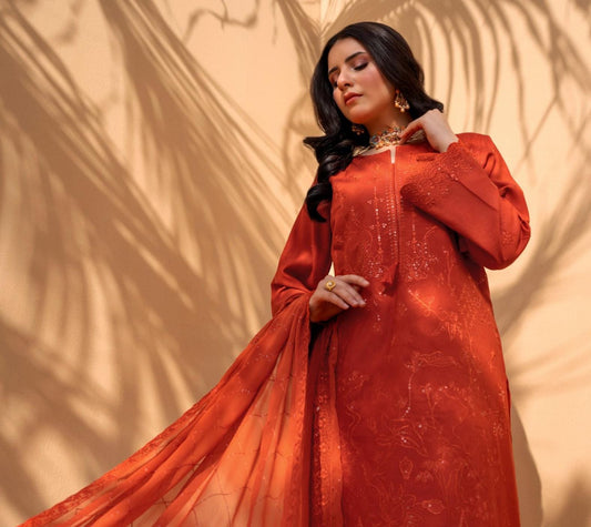 Rust Iconic Rujhan Luxury Cotton 3pc unstitched suit worn by model showcasing a festive 3-piece look.