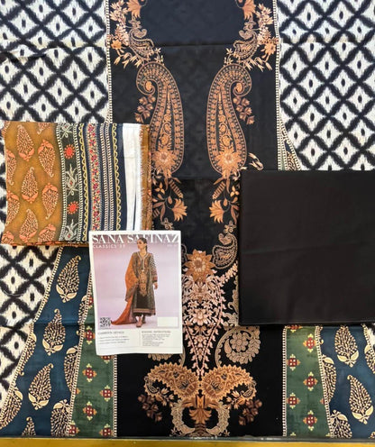 Fabric swatches with intricate patterns and a fashion magazine on a checkered background