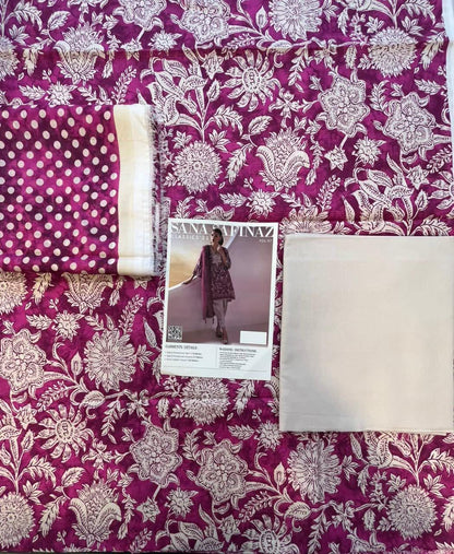 Fabric with floral pattern and a magazine on top