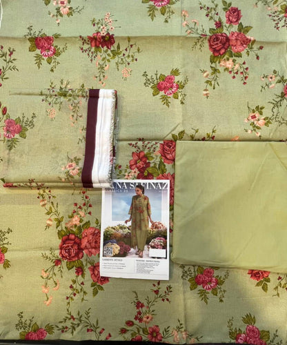 Floral fabric with a magazine and ribbon on top