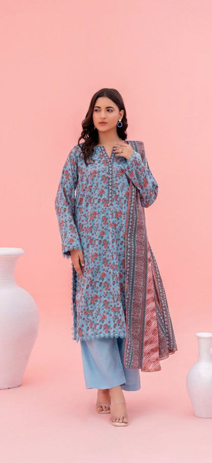 Woman wearing a floral dress with a pink background