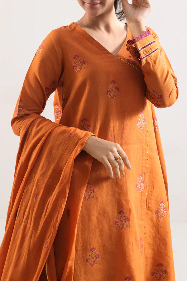 Rust Saya Cotton Jacquard 3pc suit worn by model showcasing luxury unstitched tailoring.