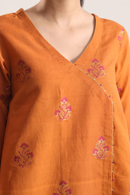 Rust Saya Cotton Jacquard 3pc suit worn by model showcasing luxury unstitched tailoring.