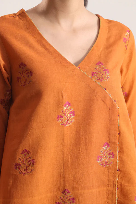 Rust Saya Cotton Jacquard 3pc suit worn by model showcasing luxury unstitched tailoring.