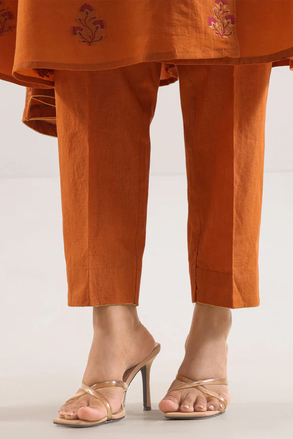 Rust Saya Cotton Jacquard 3pc suit worn by model showcasing luxury unstitched tailoring.